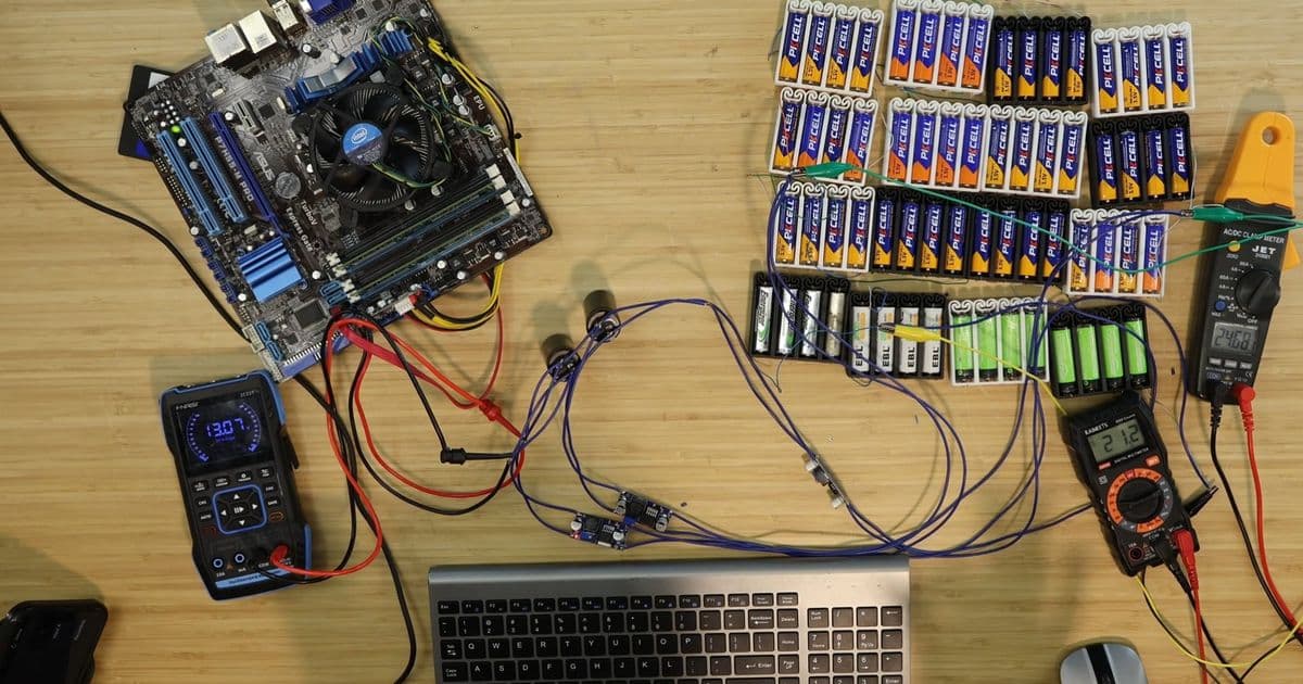 Enthusiast Sextuples AA Battery PC Runtime to 30 Minutes Using 64 Cells and Parallel Voltage Regulators