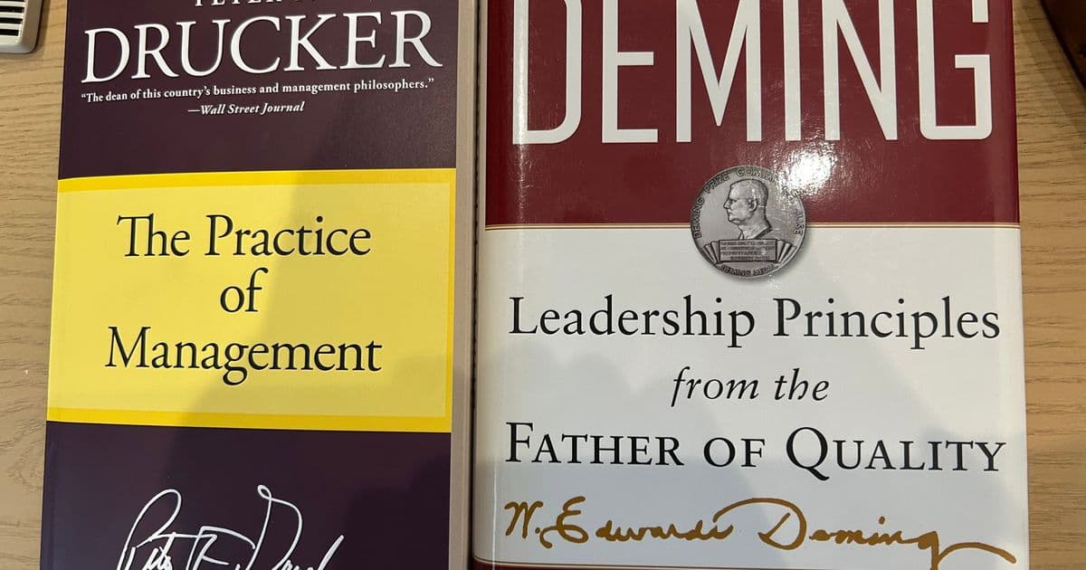 The Bandwidth Bottleneck: Why Drucker's Management Philosophy Prevailed Over Deming's Systemic Wisdom