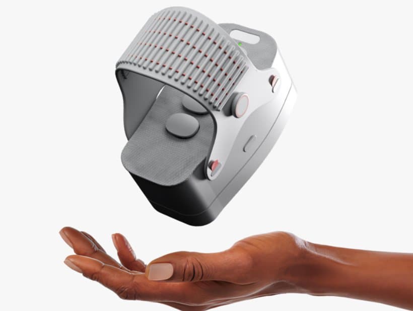 ARCH Wearable Simulates Walking While Sitting: Engineering Muscle Activation for Sedentary Users