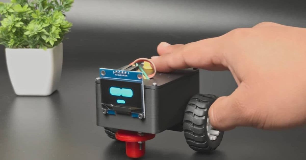 This adorable ESP32 desk robot won't stop bothering you until you pet it