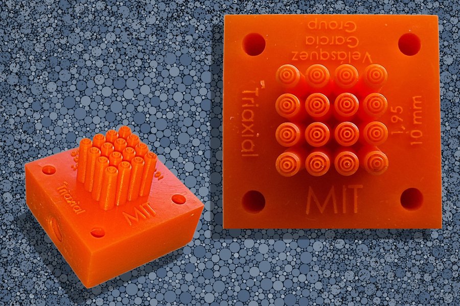 An aerial and side view of a 3D printed square with an array of nozzles in center.