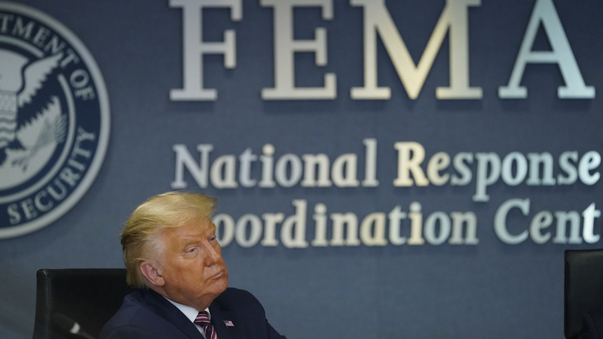 U.S. President Donald Trump listens during a meeting at the Federal Emergency Management Agency (FEMA) headquarters in Washington, D.C., U.S., on Thursday, Aug. 27, 2020.