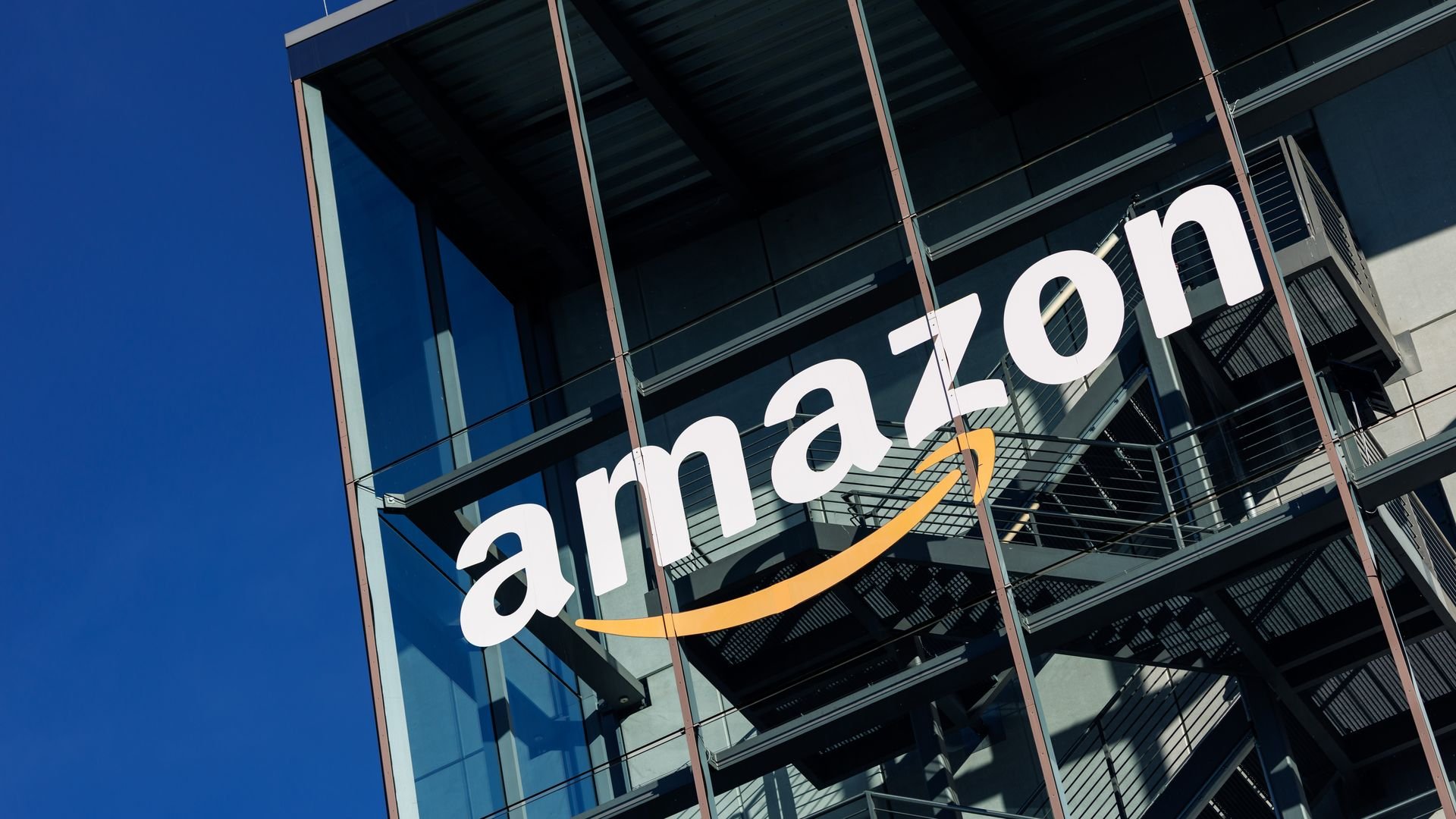 Amazon's logo on the side of an office building. 