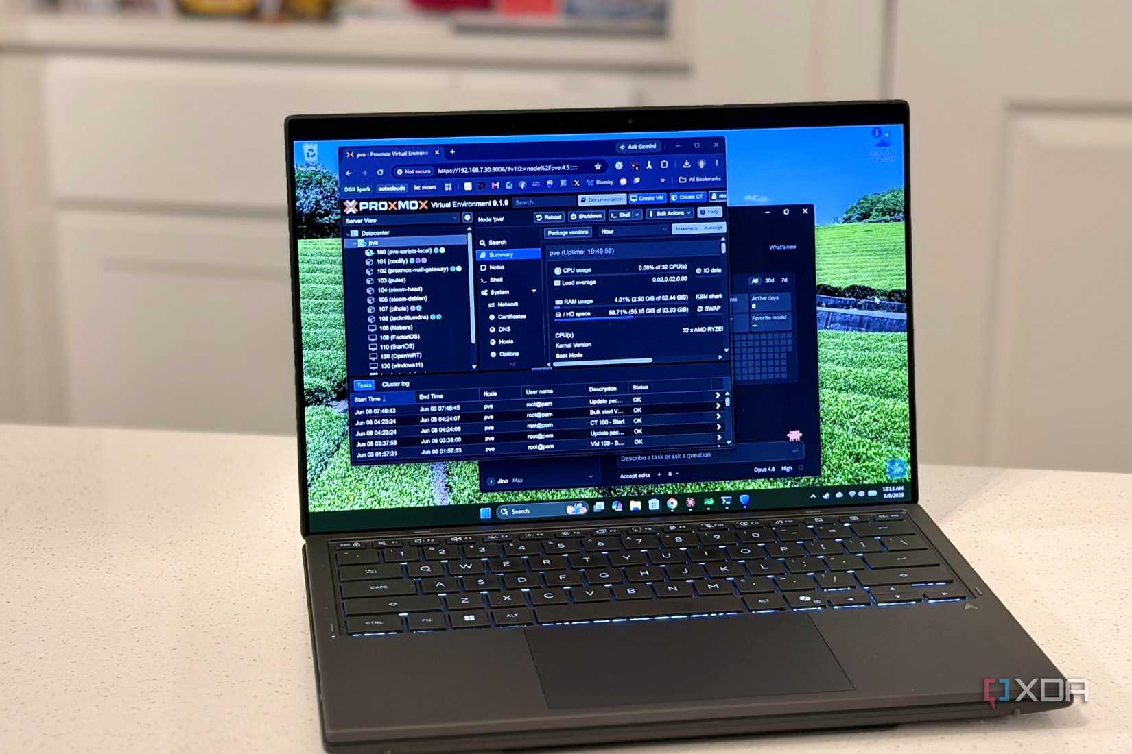 proxmox and claude windows open on a laptop screen