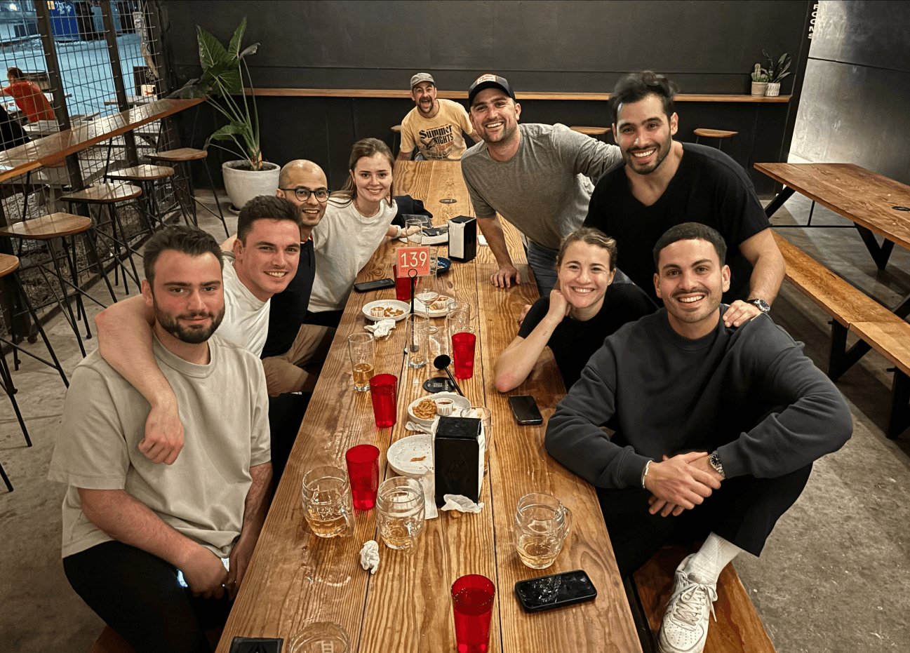 Team members at dinner in Austin for a company off-site event.