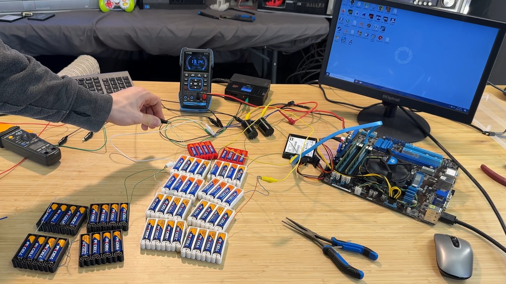 56 AA batteries powering an old desktop PC
