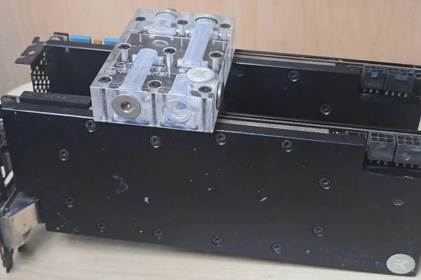 Reddit User Scores Dual Nvidia GTX Titan X GPUs with Water Cooling for Just $86