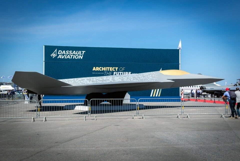 Full-scale NGF combat aircraft mock-up on display outside with Dassault Aviation branding.