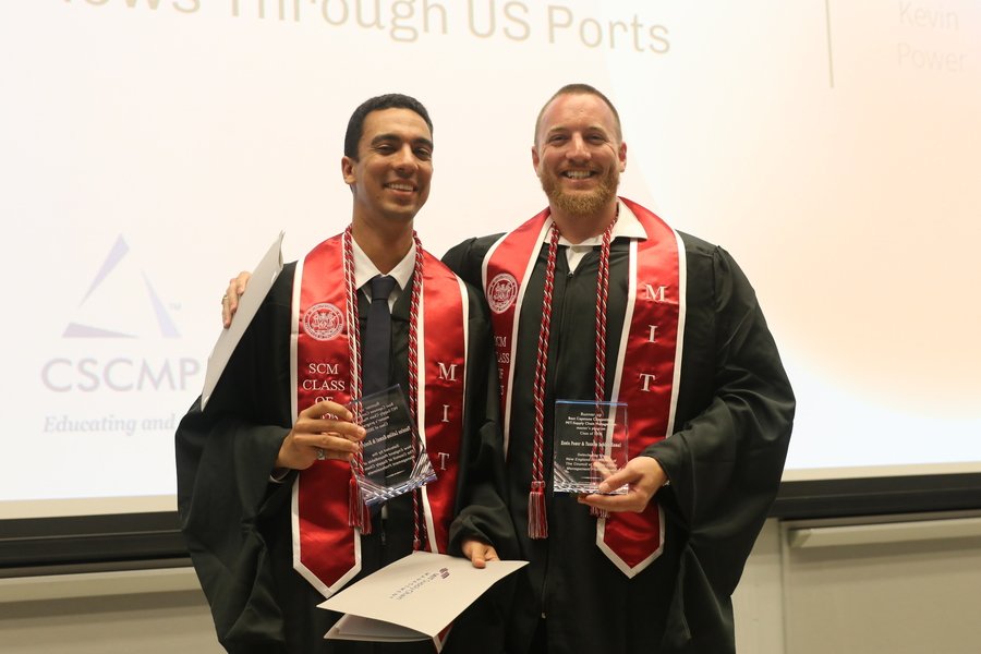 Yassine Lahlou-Kamal and Kevin Power in graduation regalia including 