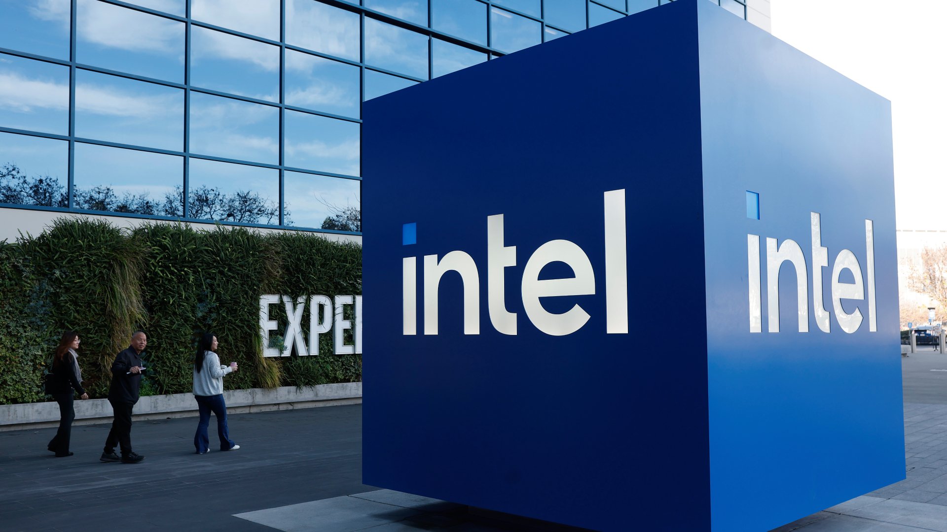 Intel Headquarters, with people walking by 