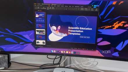 A monitor displaying the macOS desktop running WPS Office