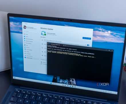 A windows 11 laptop running a PowerShell script to install updates and rreboot