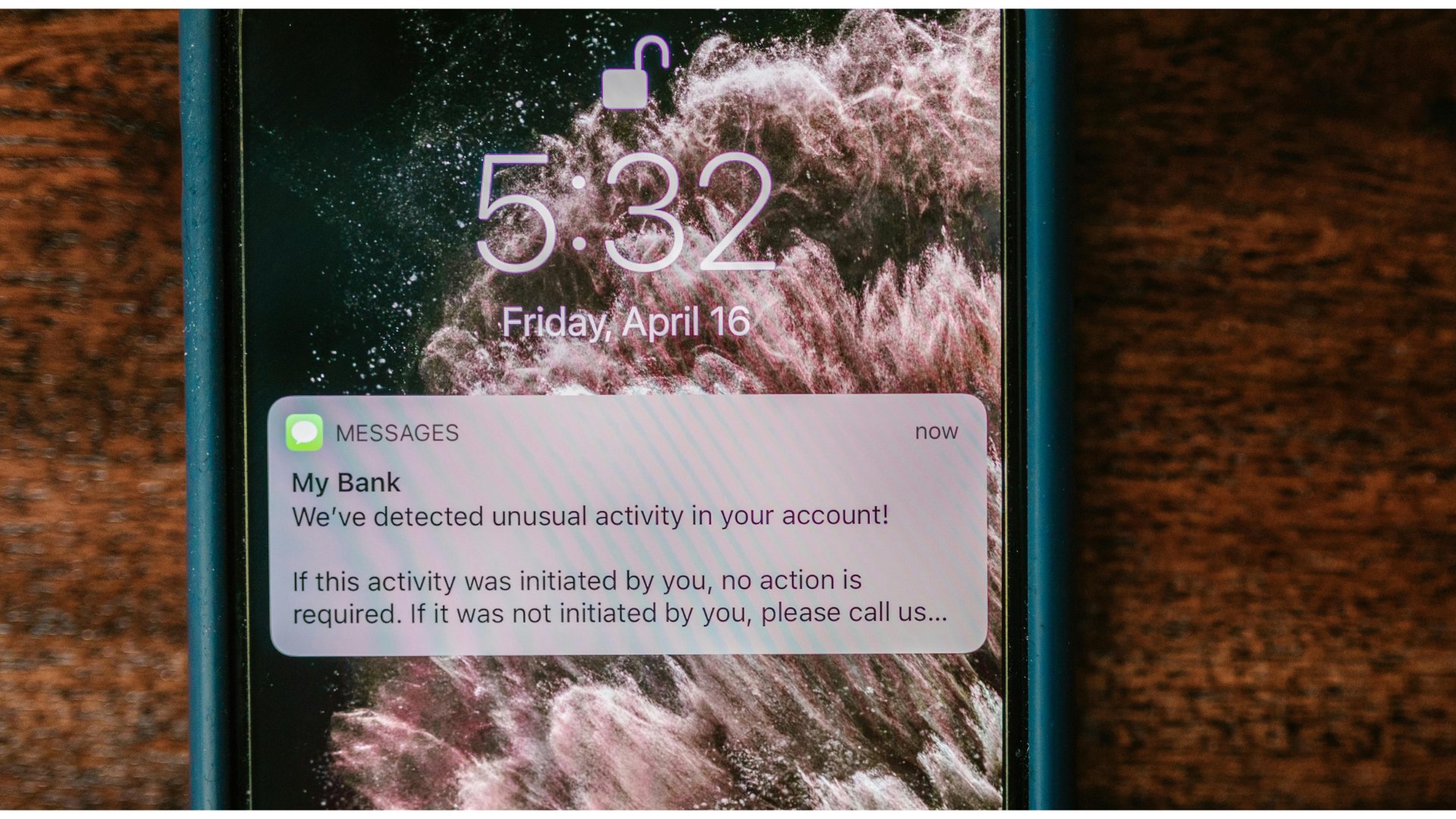 a smishing text message on a phone