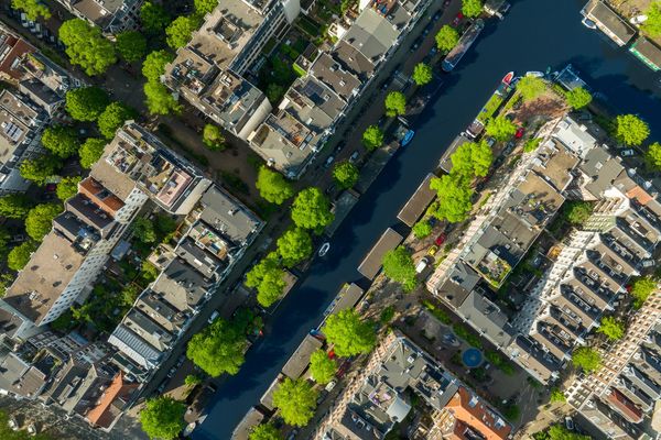 Urban Shade Inequality: Wealth Disparities Drive Unequal Heat Protection in Global Cities