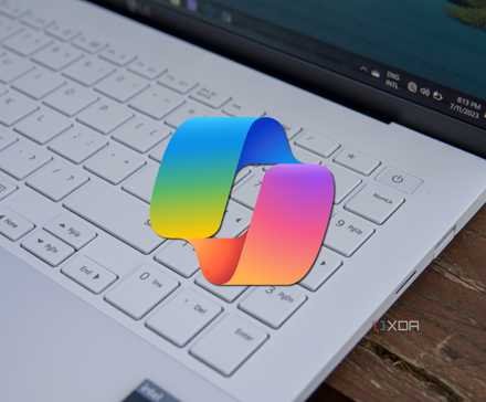 Close-up of a laptop keyboard with the Microsoft Copilot logo overlaid on top of it
