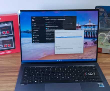 A Windows 11 laptop showing storage sense settings and the dialog for optimizing drives