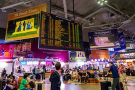 A large train schedule board at Boston’s South Station.
