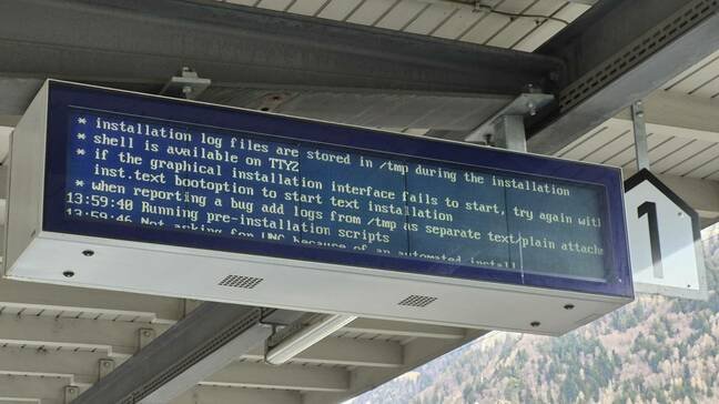 Swiss train platform information screen showing Linux boot error