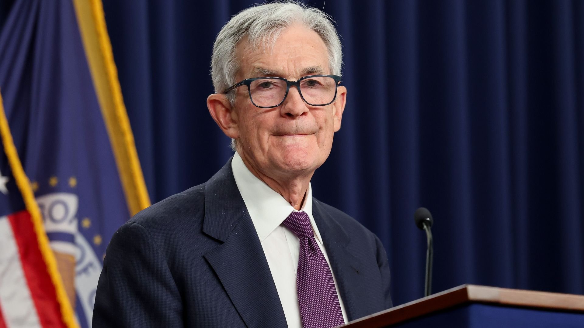 Fed chair Jerome Powell standing at a podium