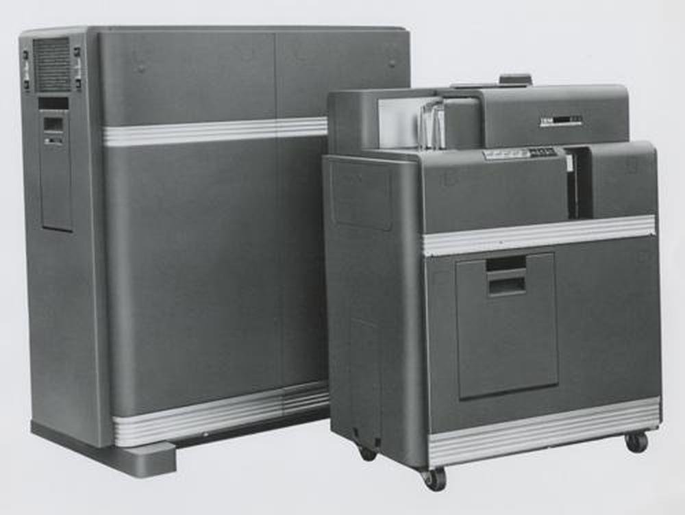 The IBM 604 Electronic Calculating Punch behind a Type 521 Card Reader/Punch. Photo from IBM.
Note the panels in the side of the 604 and in the front of the 521 to hold plugboards.