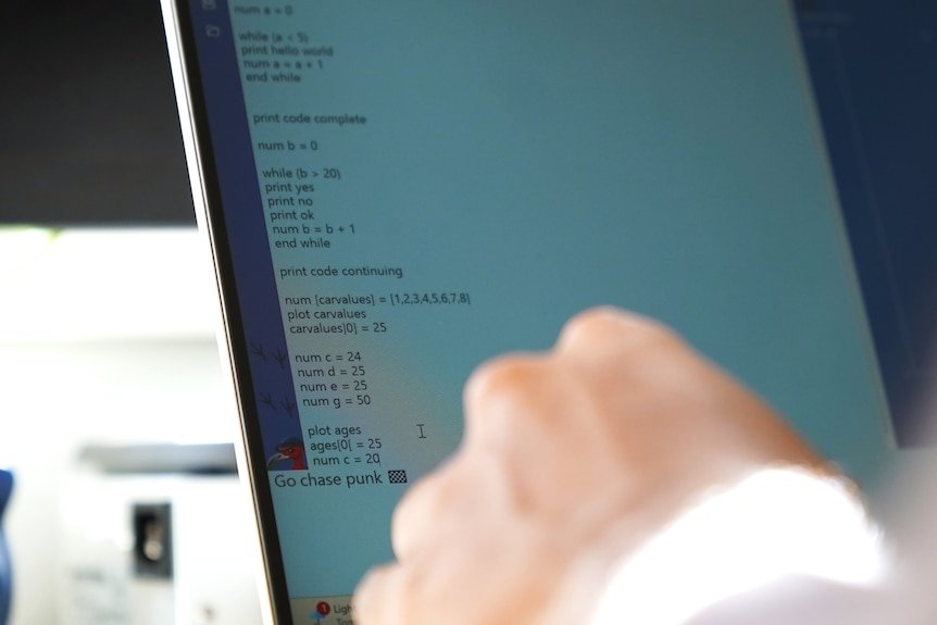 A close-up of a computer screen which shows lines of code