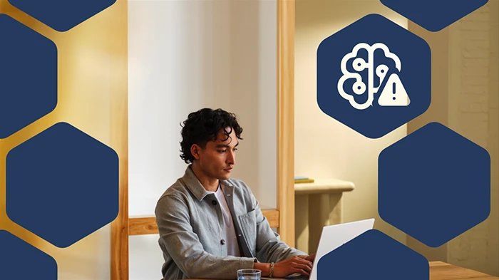 Photo of user on a computer, with hexagon icons overlaid