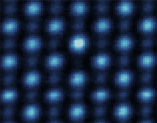 In a lattice of atoms, atoms light up individually 