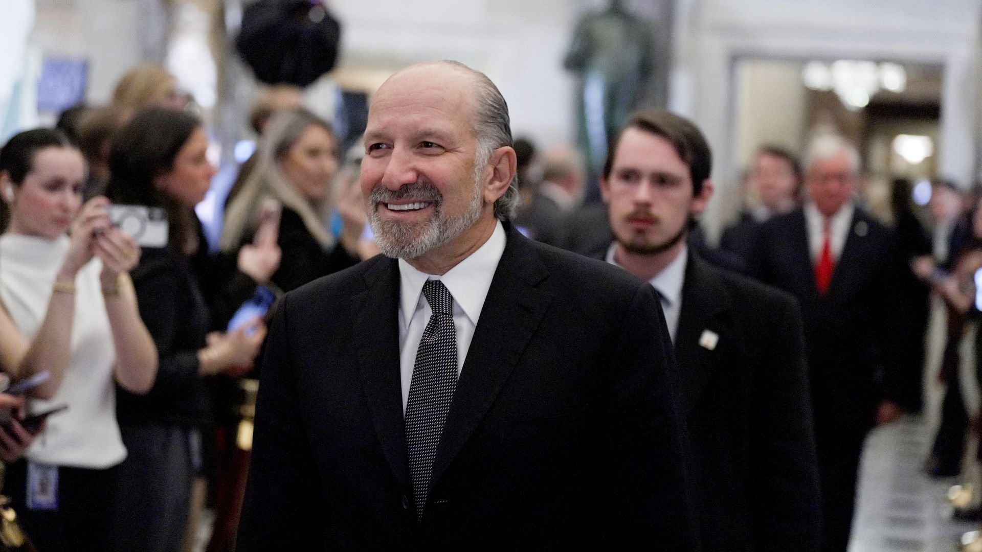 Howard Lutnick, US commerce secretary, walks through Statuary Hall while arriving for a State of the Union address at the US Capitol in Washington, DC, US, on Tuesday, Feb. 24, 2026. President Trump needs his State of the Union address to assuage voters anxious about the economy, foreign policy and 