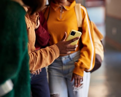 Young people looking at a smartphone