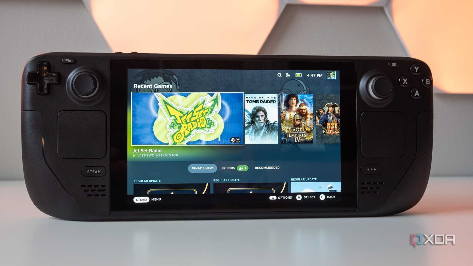 Valve's Steam Deck with SteamOS' main menu open 