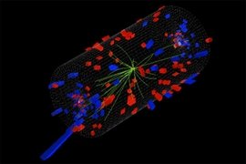 A proton collides with a lead nucleus, sending a shower of particles through the CMS detector.
