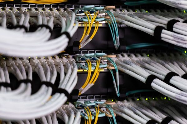 Bain Cuts Ties With Megaspeed Amid US Investigation Into AI Chip Export Violations