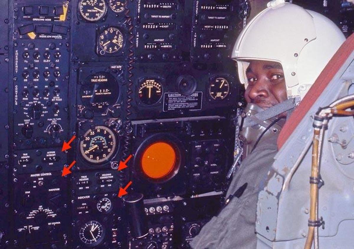 The navigator's station in a B-52. Some of the Astro Compass controls are indicated with arrows: the Line of Position display and the Master Control on the left, and the Heading display and Indicator display to the right. The navigator in this photo is Carl Hanson-Carnethon. From Rob Bogash's B-52 photo album. This specific B-52 (#2584) is now at The Museum of Flight, Seattle, but the Astro Compass is no longer present.