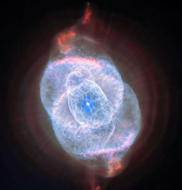 An image taken by the Hubble Space Telescope showing the Cat's Eye Nebula.