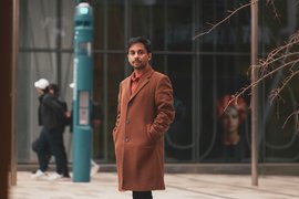 Dwai Banerjee stands outside near the MIT Museum
