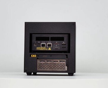 Front view of the ITG Cube 3D-printed enclosure showing power button, USB ports, and compact cube design