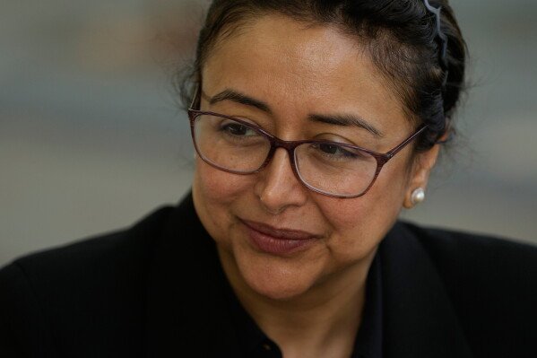 Attorney Dr. Nidaa Pervaiz is interviewed outside of Immigration Court Tuesday, May 12, 2026, in Concord, Calif. (AP Photo/Jeff Chiu)