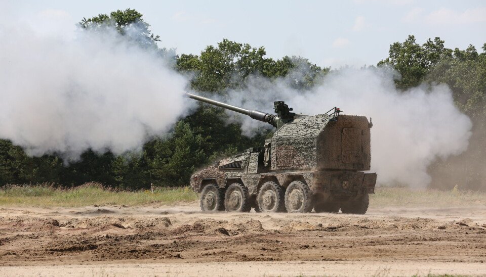 RCH 155 mobile artillery module mounted on a Boxer armored vehicle chassis, opens fire at a military  training area in Germany.