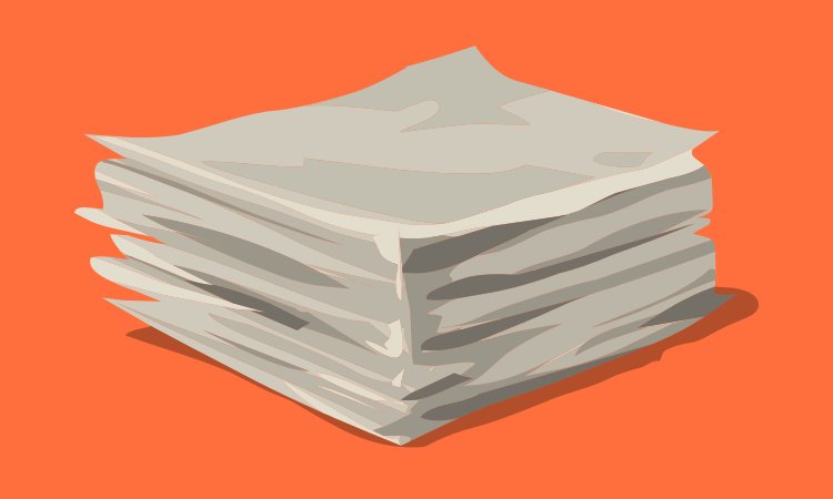 A stack of a paper on a creamy orange background